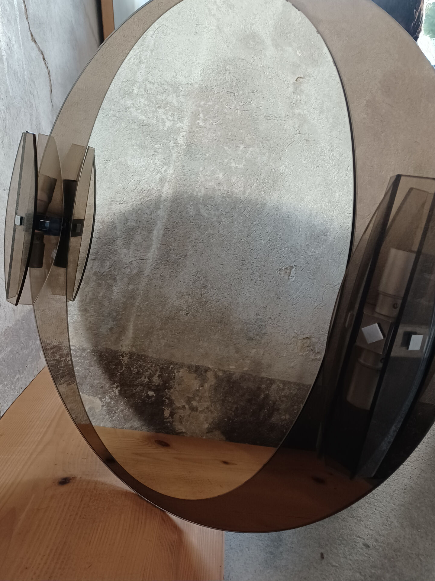 Round mirror 70s smoked glass, 2 appliques