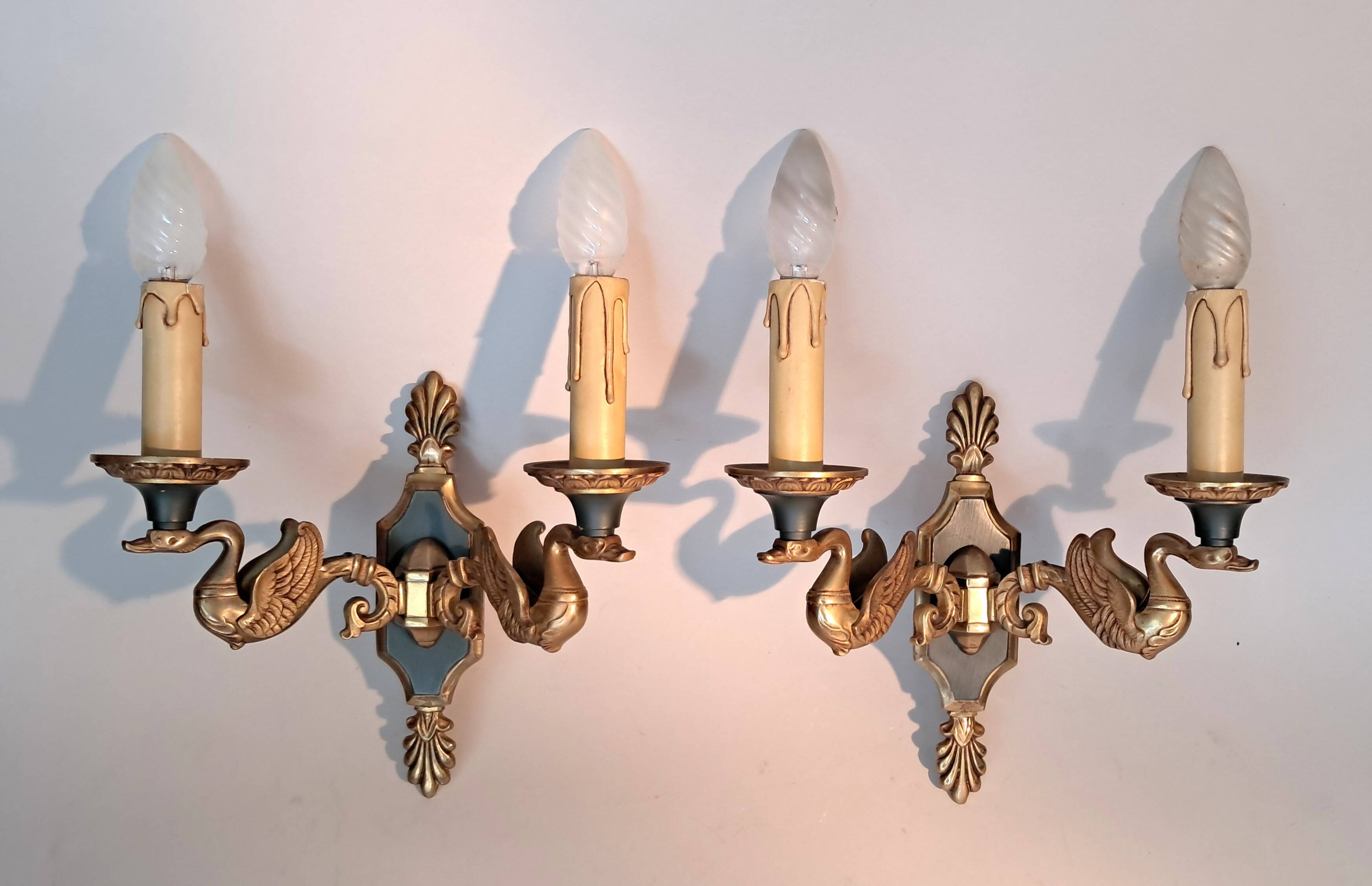 Pair of gilded bronze and green lacquer wall sconces by Maison Lucien Gau, Paris.