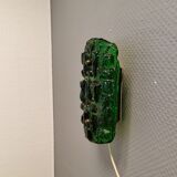 Old wall lamp made of hard pressed green glass.