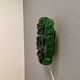 Old wall lamp made of hard pressed green glass.
