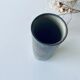 Signed ceramic tubular vase