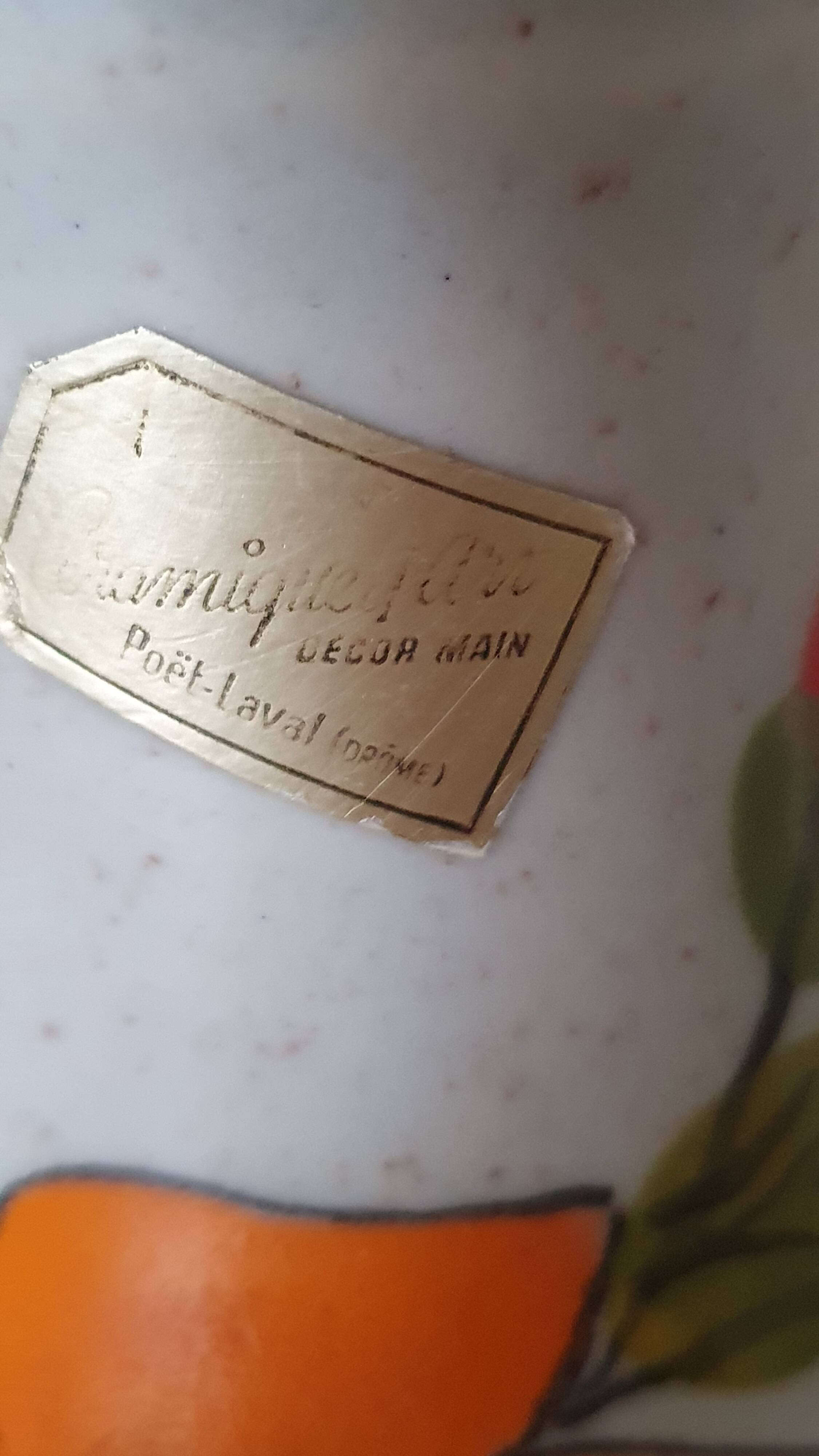 Ceramic vase or pitcher with Poët Laval floral motifs