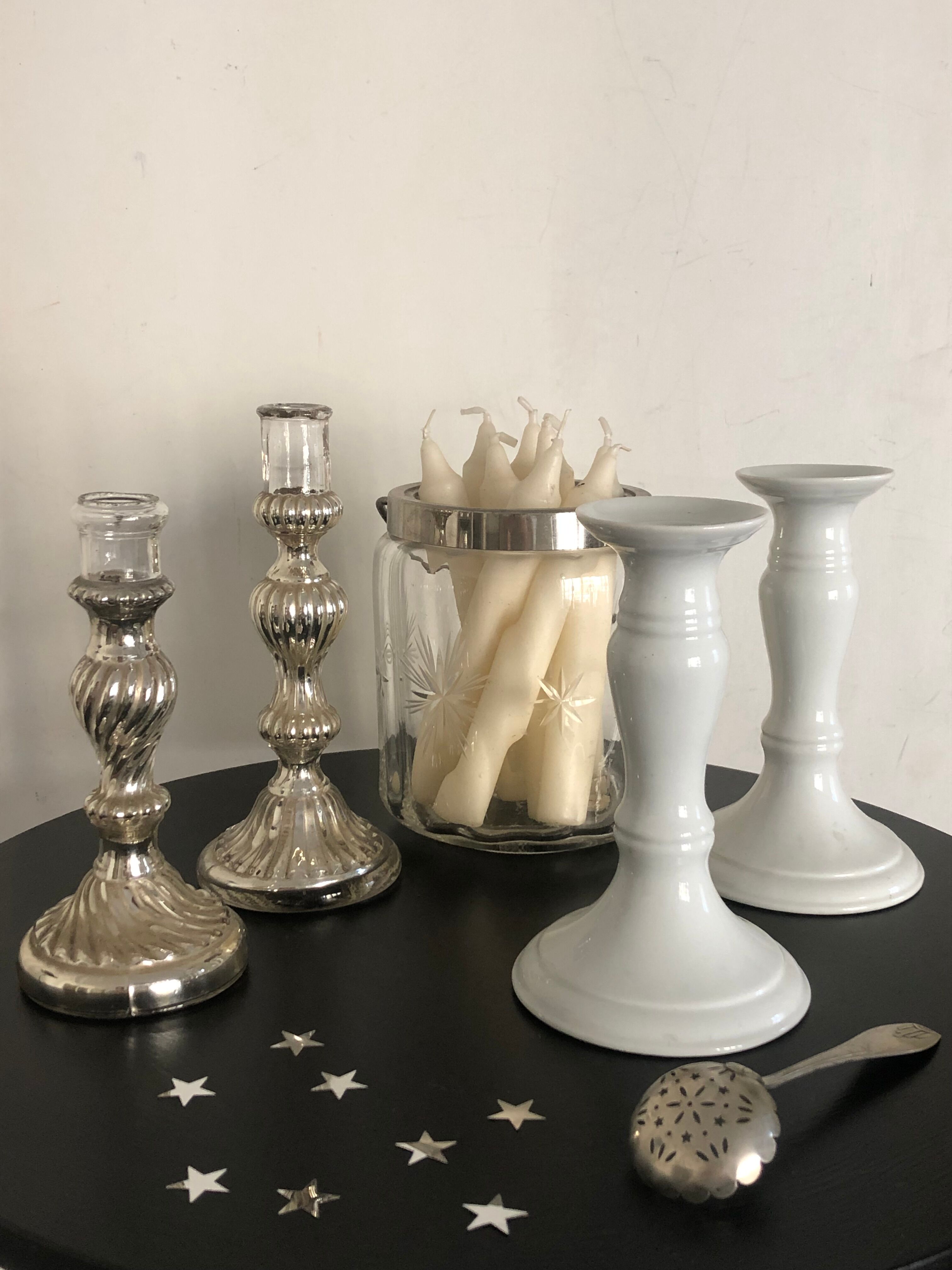 Pair of mercerized candle holders