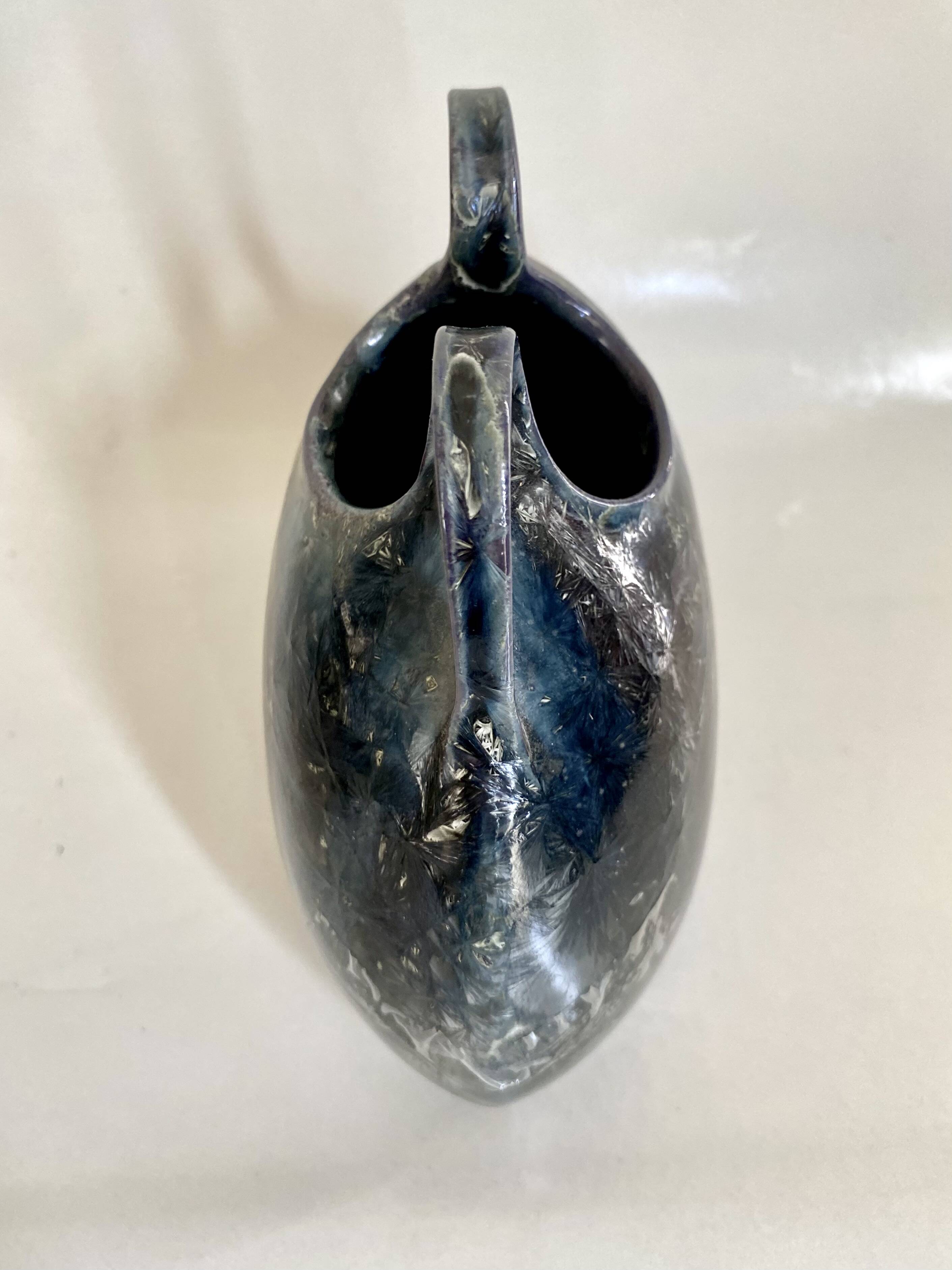 Iridescent ceramic vase with handles