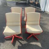 Set of 4 vintage 1970s swivel chairs in red and beige.
