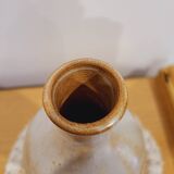 Bouteille fleurie en grès émaillé