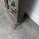 Renaissance-style mirror in wood and copper with a craftsmanship theme.