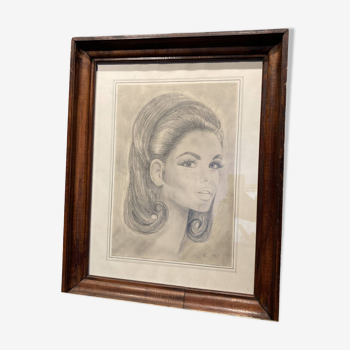 Framed drawing representing a woman, signed ER.