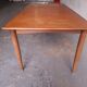 Scandinavian type table with integrated extension