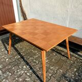 Dining table with tapered legs