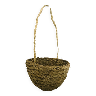 Hanging woven wicker planter
