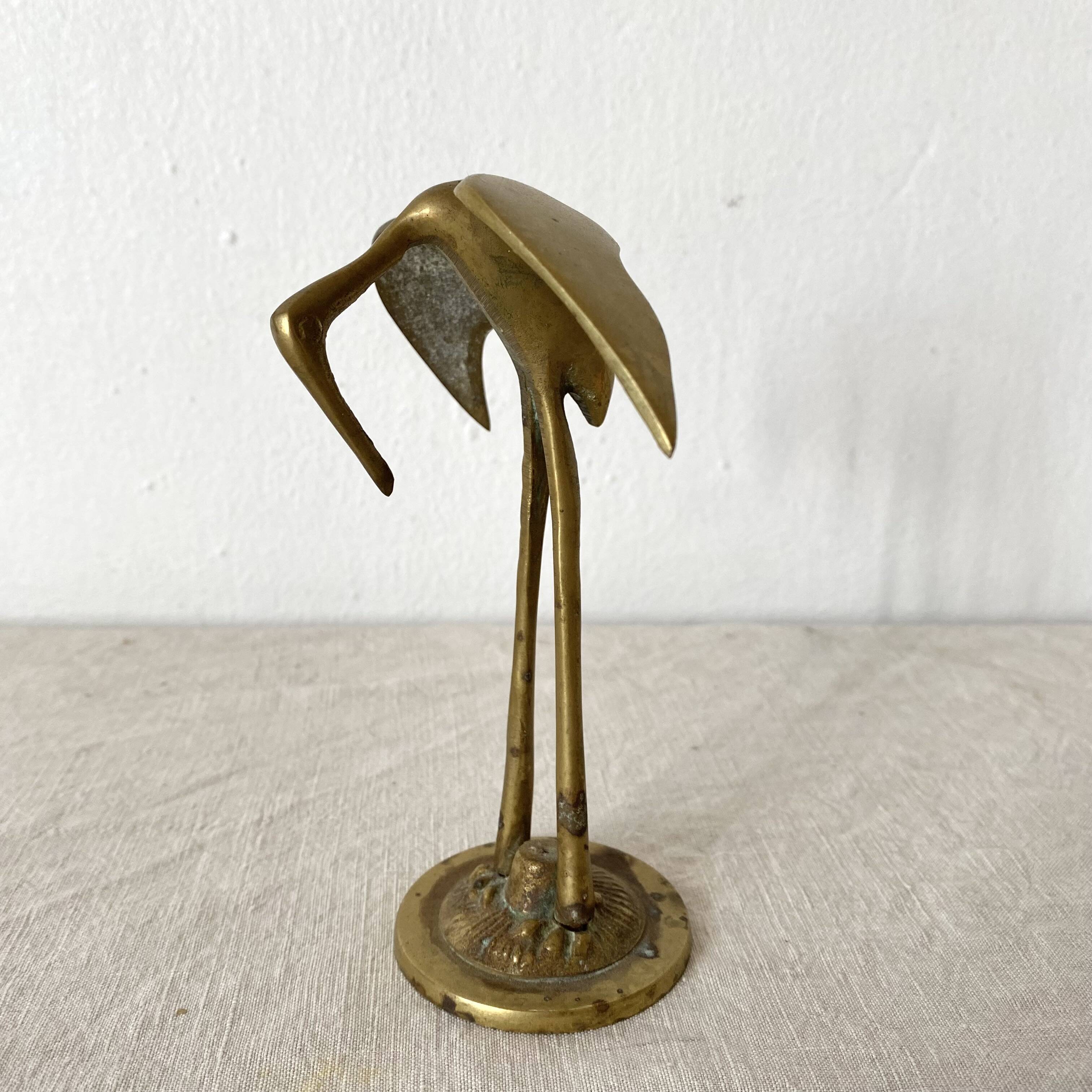 Golden brass bird