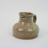 Flat jug in heavy beige stoneware