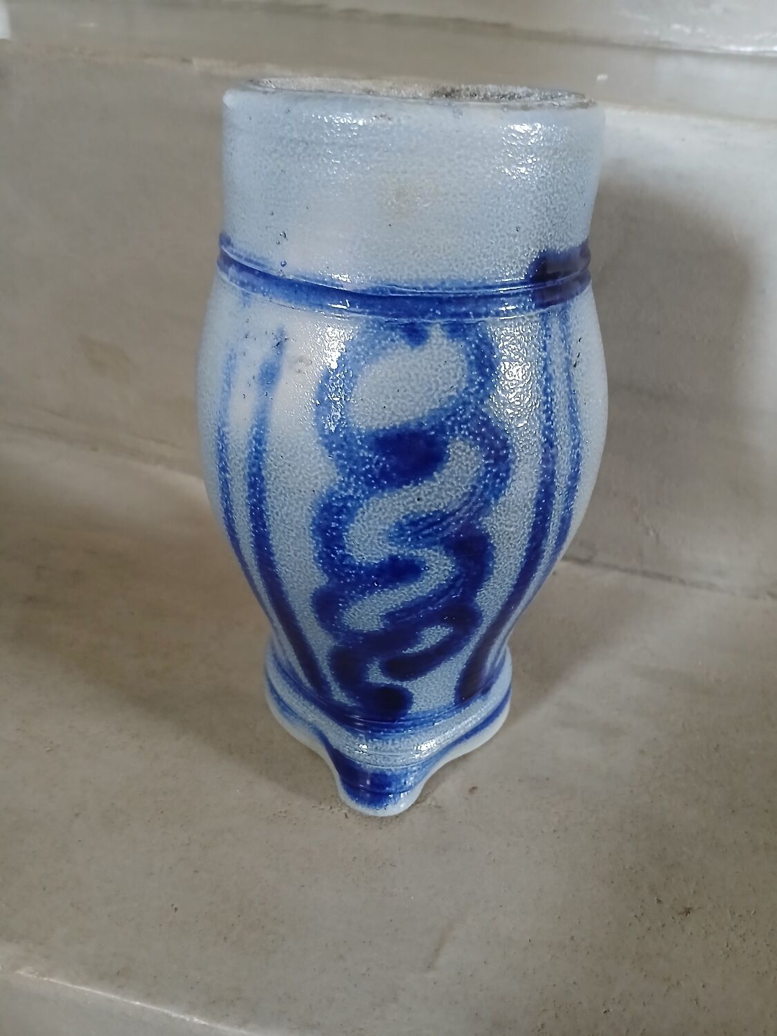 2 antique stoneware pitchers