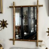 Mirror in gilded stucco, bamboo patina and gold leaf.