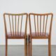 Set of 2 vintage dining chairs from the 1970s with spindle backrest and fabric seat
