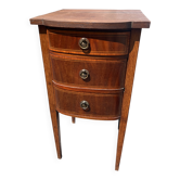 Antique bedside table in Louis XVI style made of wood.