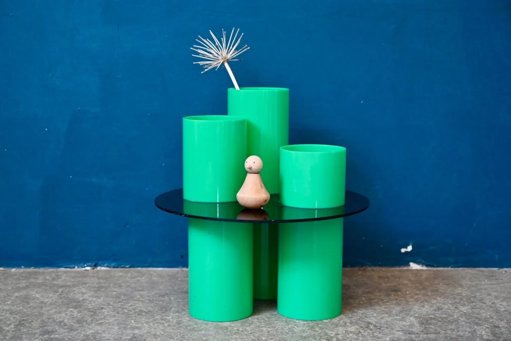 Green plexiglass coffee table in Memphis design style from the 1980s.