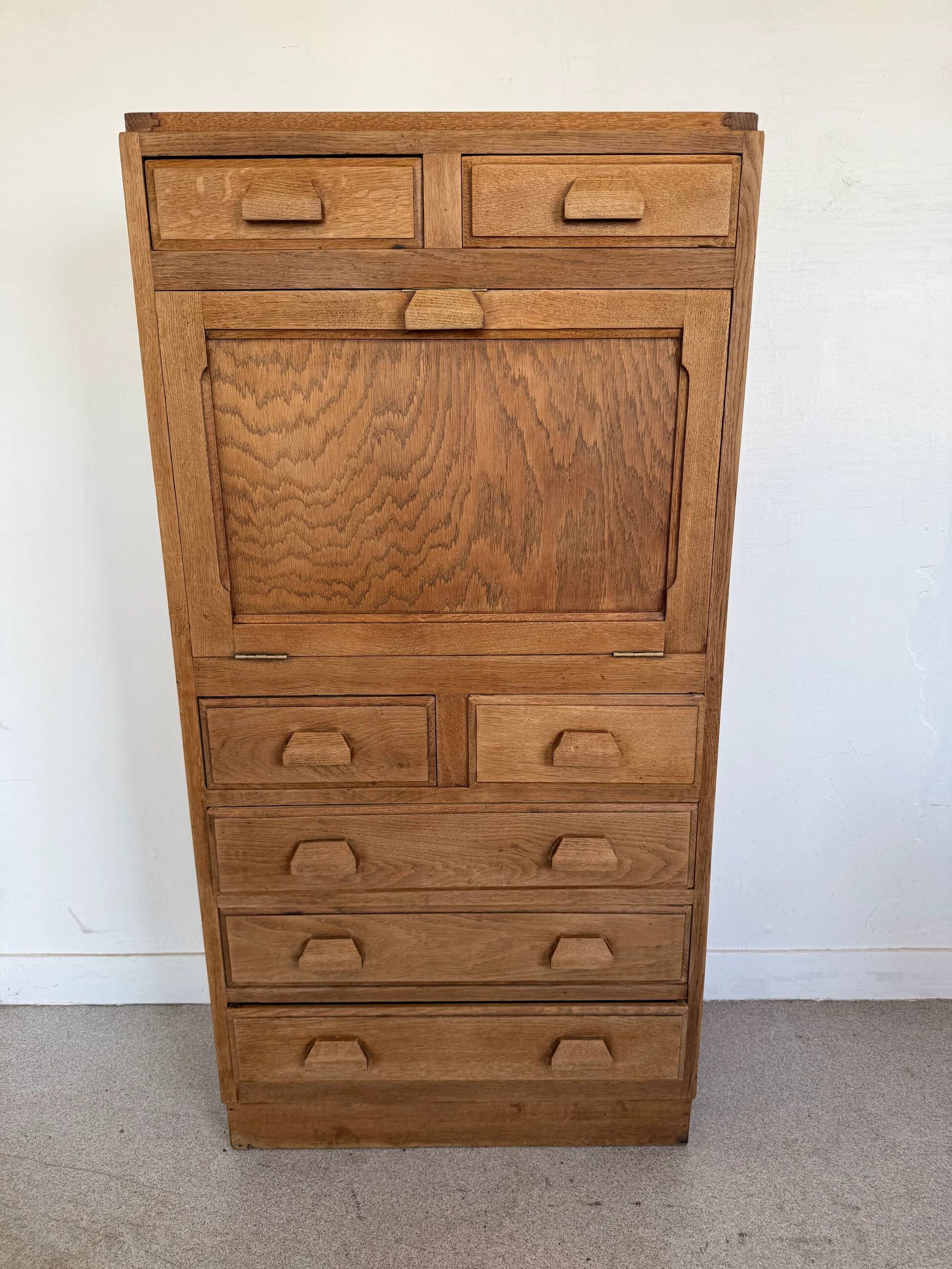 Vintage wooden secretary desk in the style of a professional piece of furniture