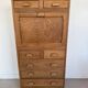 Vintage wooden secretary desk in the style of a professional piece of furniture