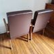 Paire de fauteuils moleskine marron
