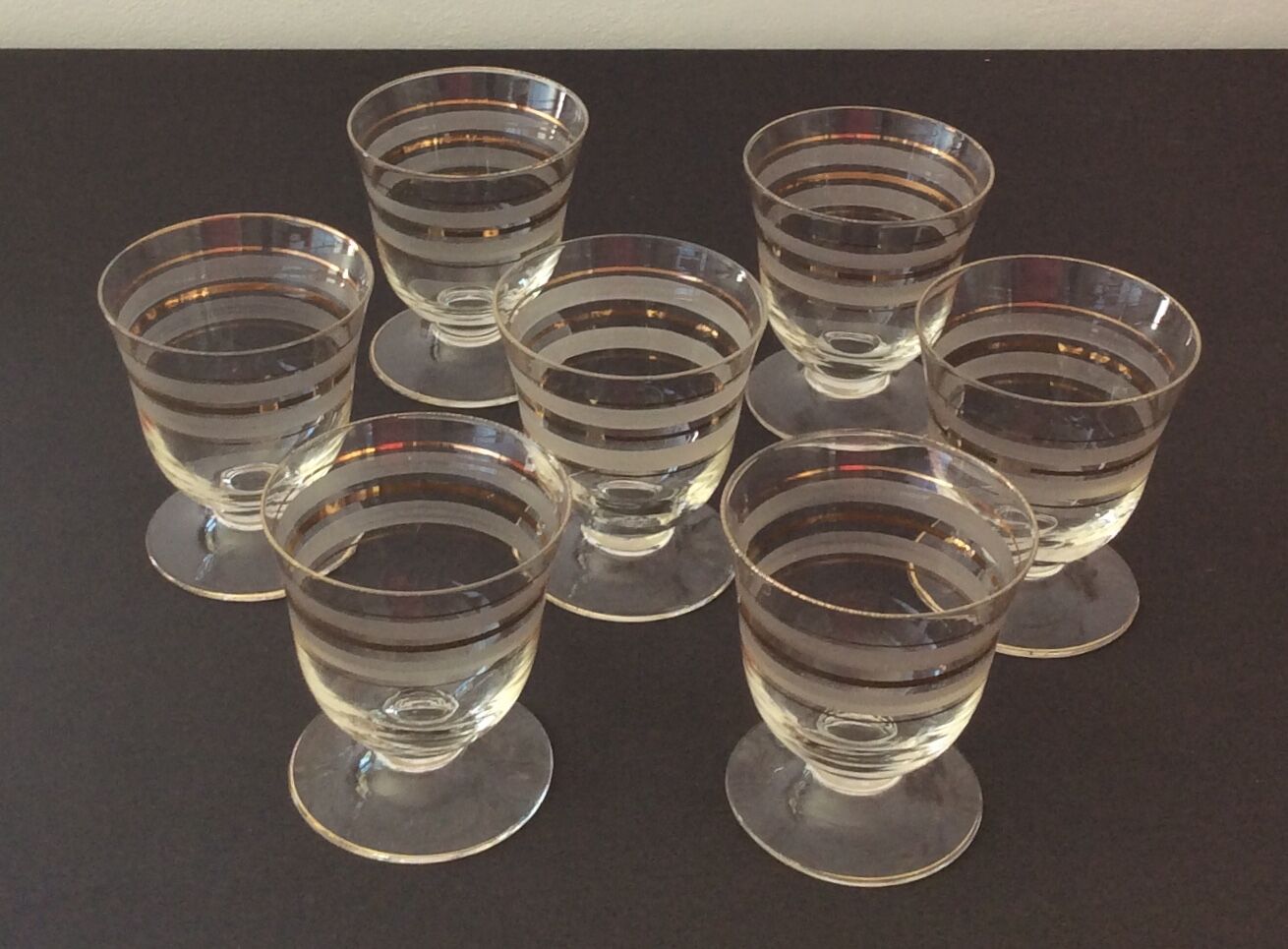 Fine glasses on pedestal with gold border - vintage