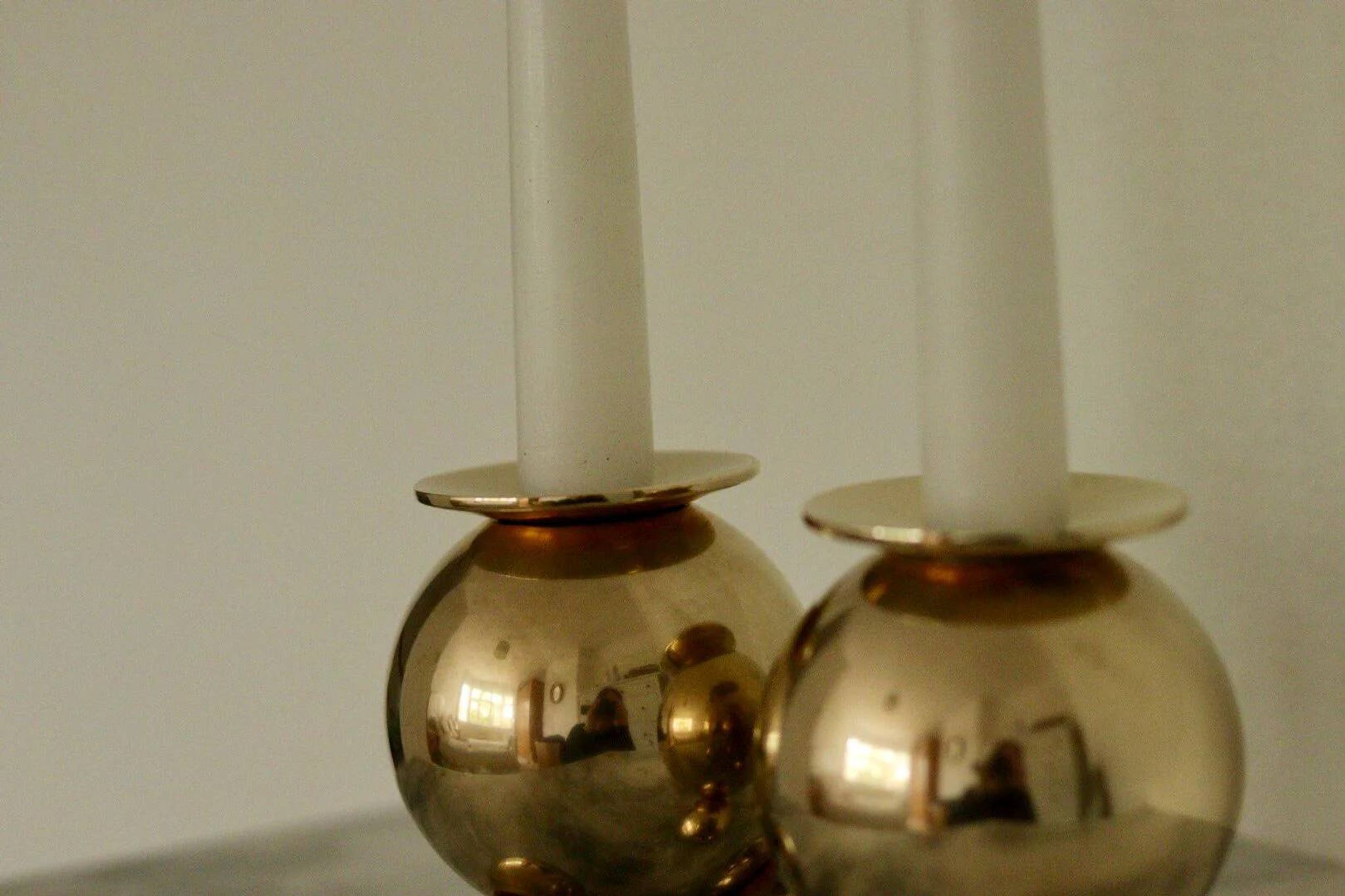 Pair of mid-century Swedish brass candle holders