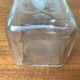 Vintage Danish glass bottle with engraving.