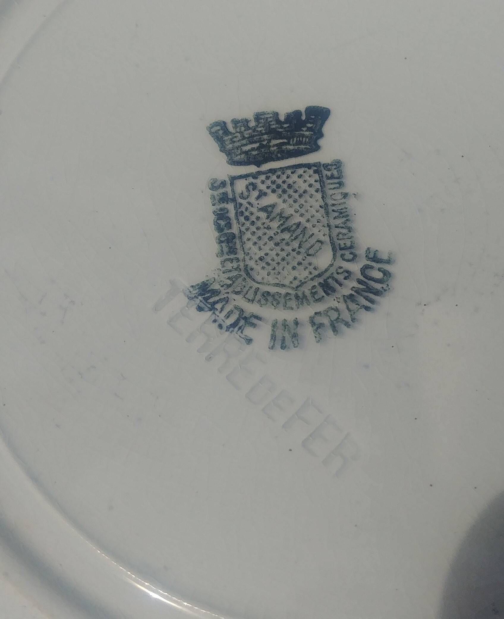 Set of eight ironstone soup plates from the Saint Amand earthenware factory