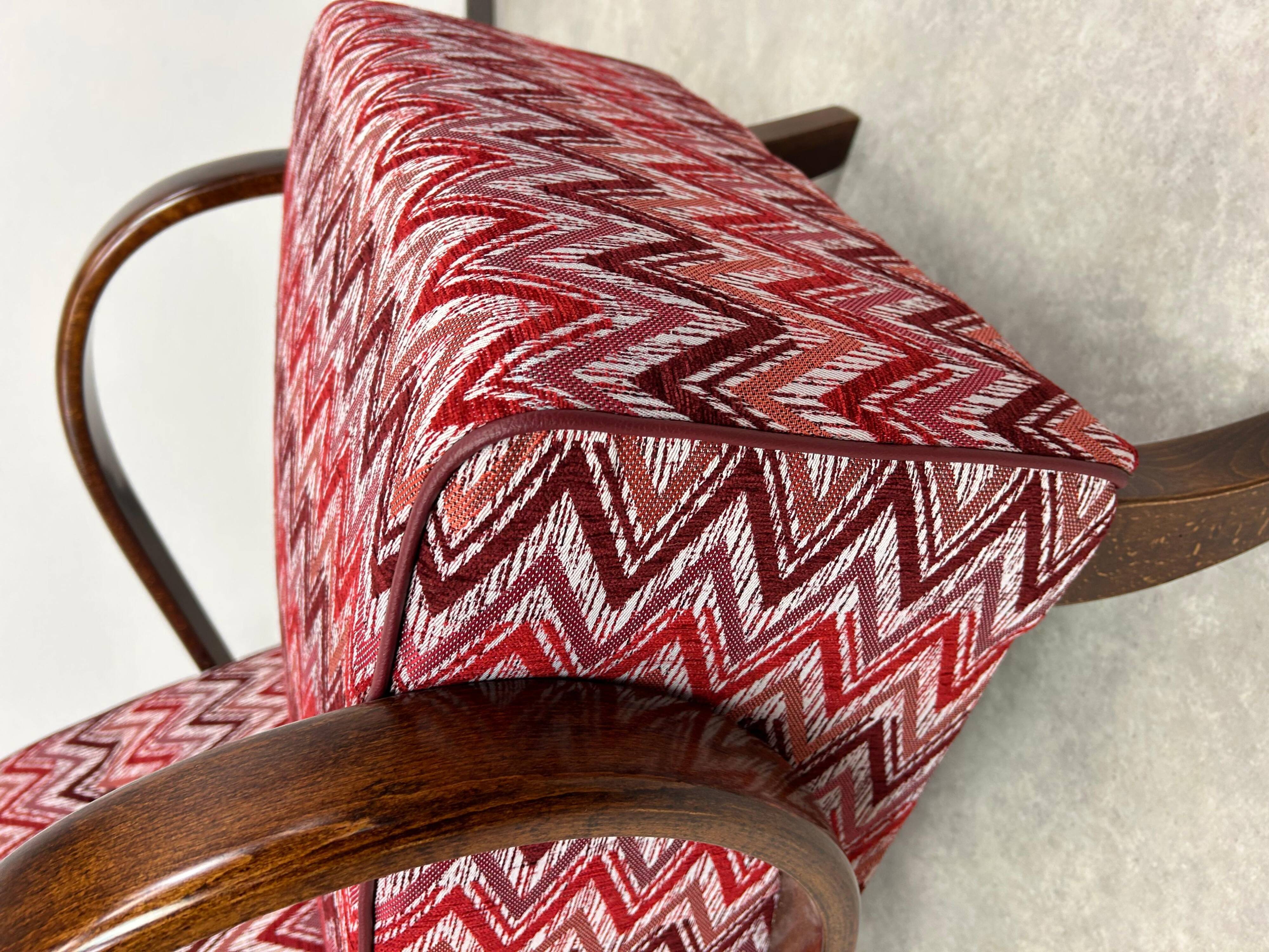 C-shaped lounge chair by J. Halabala
