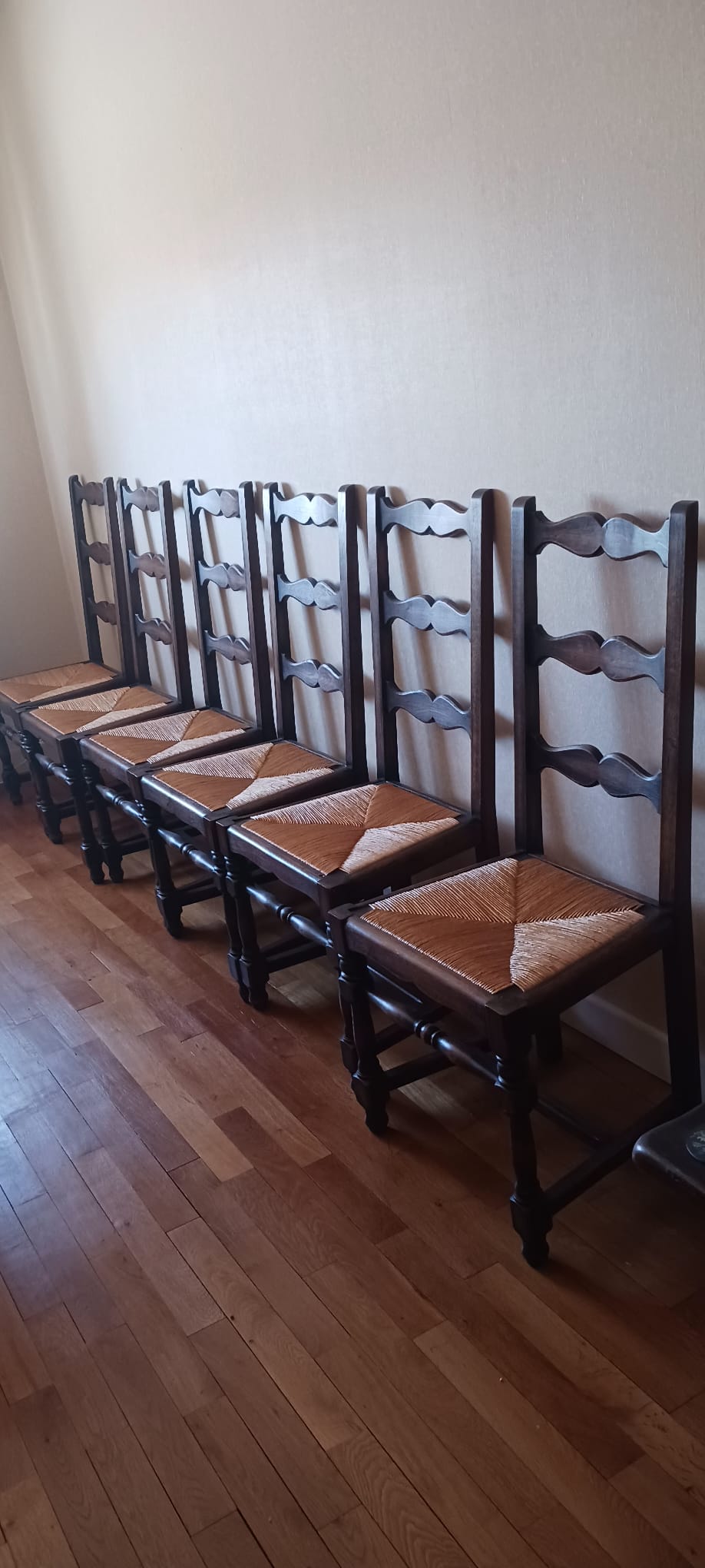 6 wooden and straw chairs