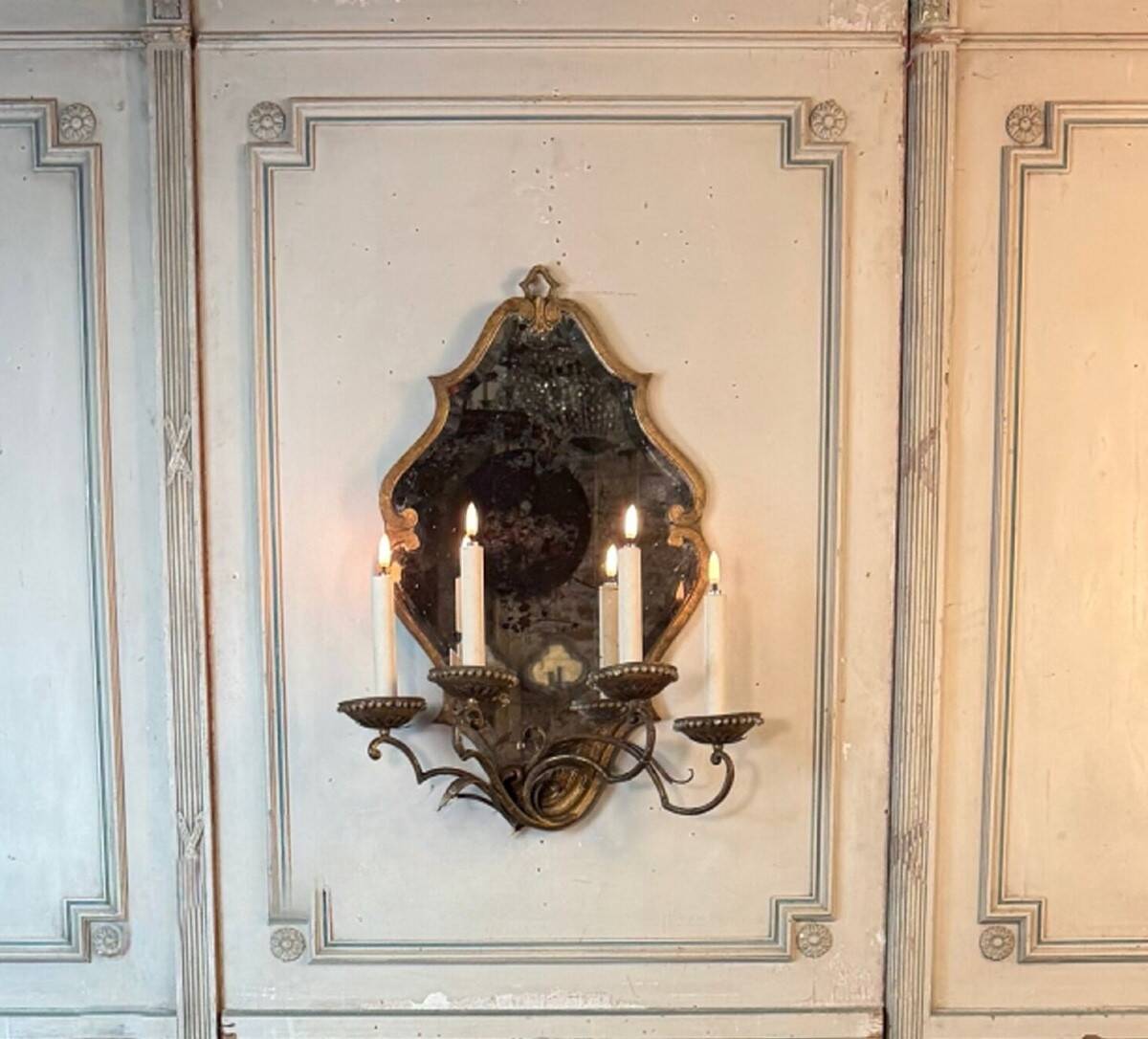Gold metal wall mirror, in the style of Maison Baguès, Paris circa 1950.
