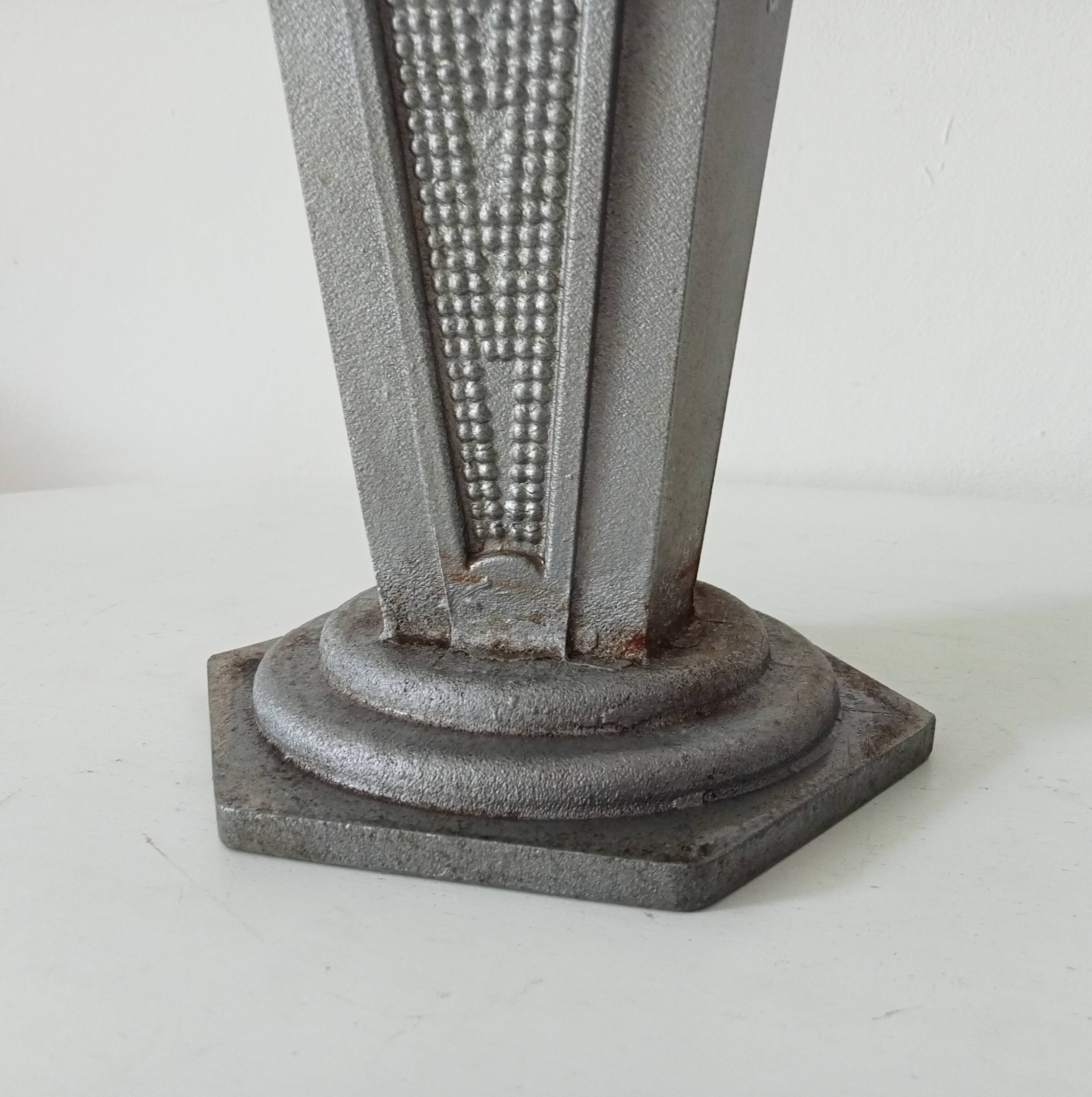 Old art deco vase in cast aluminum