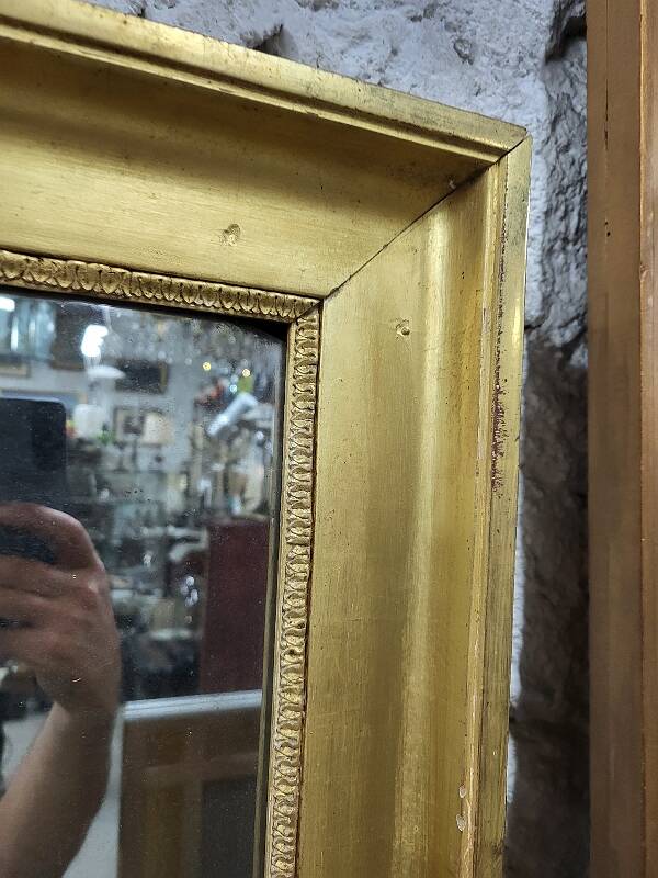 Large gilt mirror in 2 parts from the early 19th century
