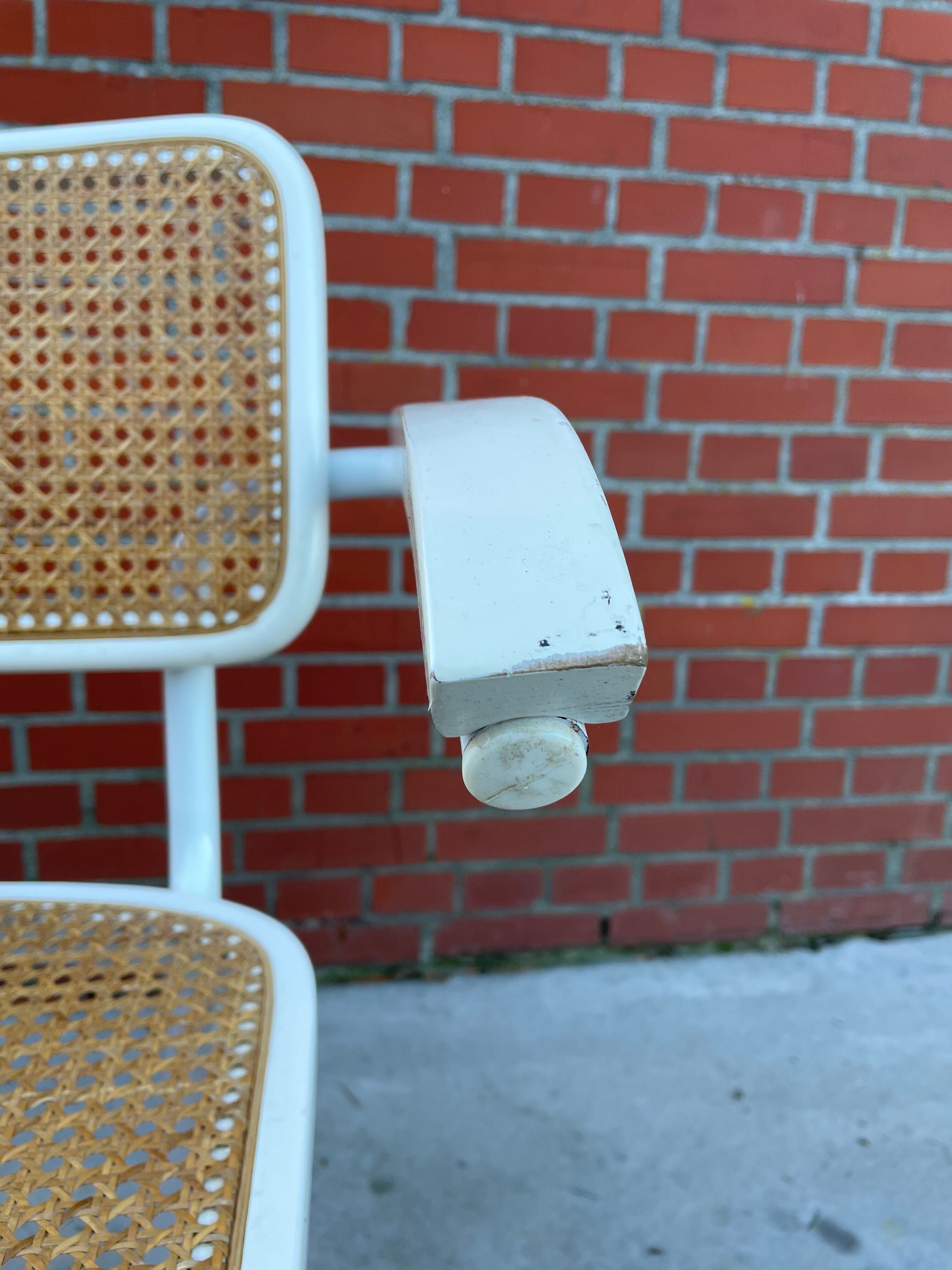 Cesca Chair model with armrest in white
