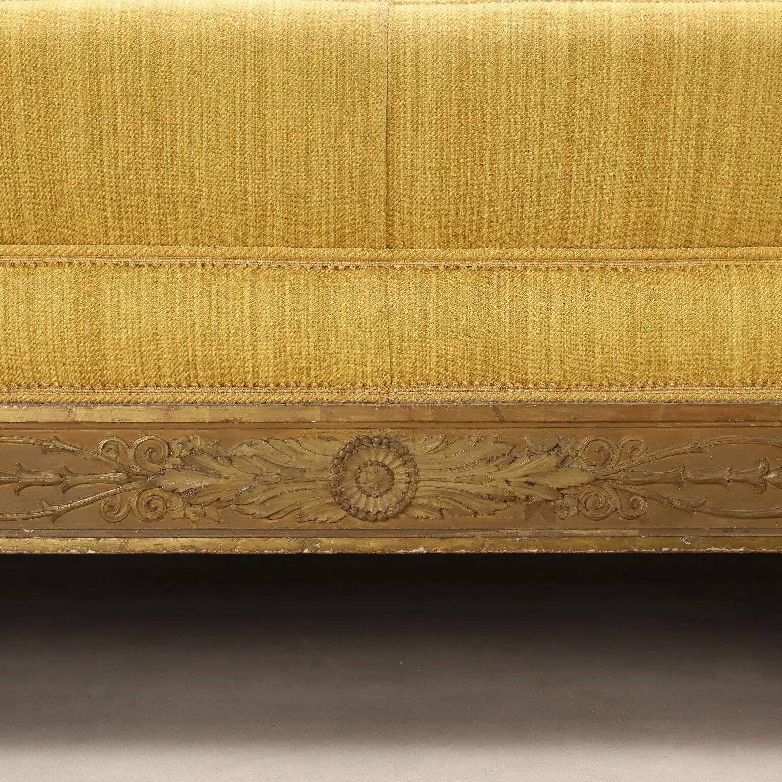 Antique restoration canapé in carved and gilded wood, Italy, 19th century.