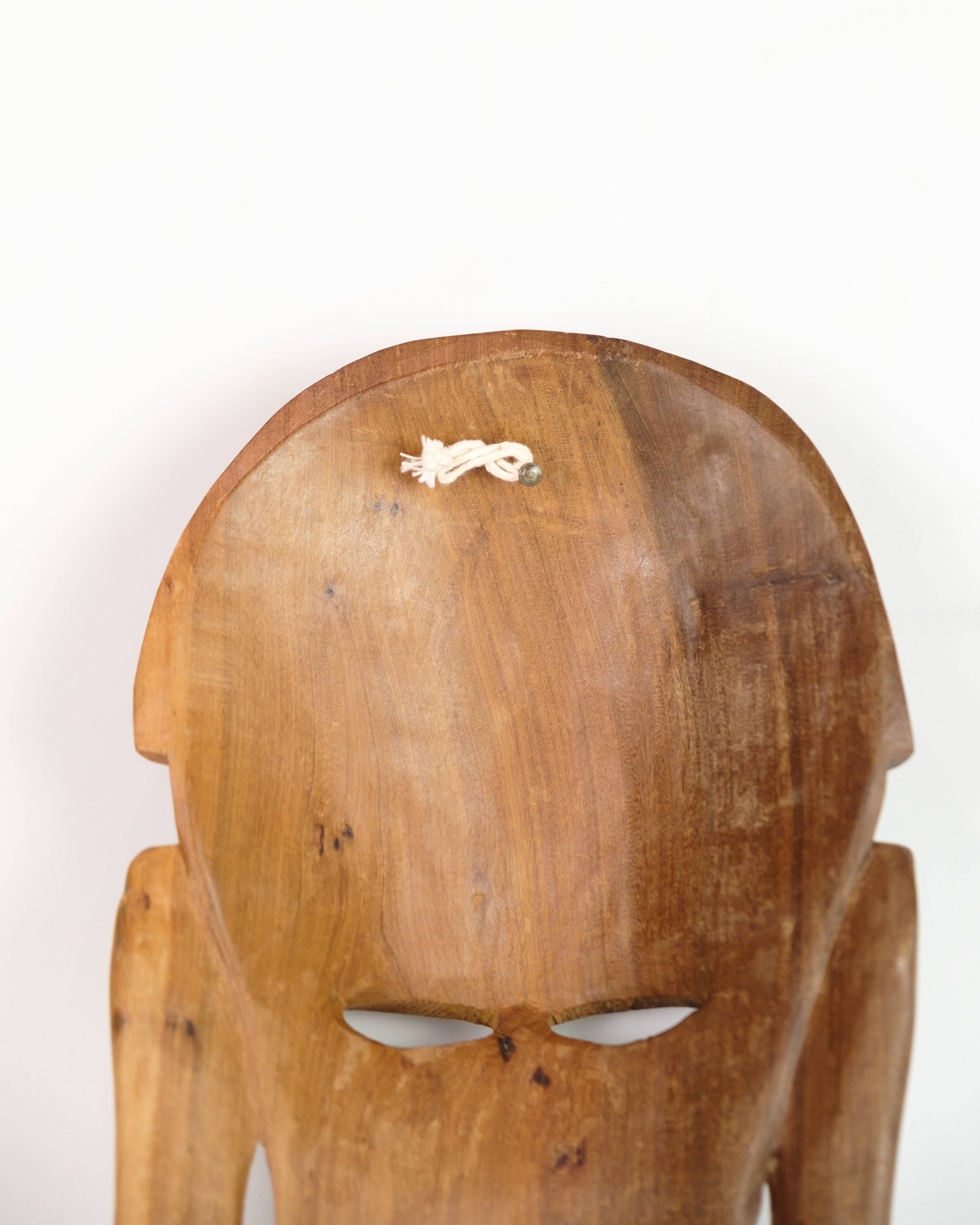African Mask Hand Carved In Light Wood From West Africa