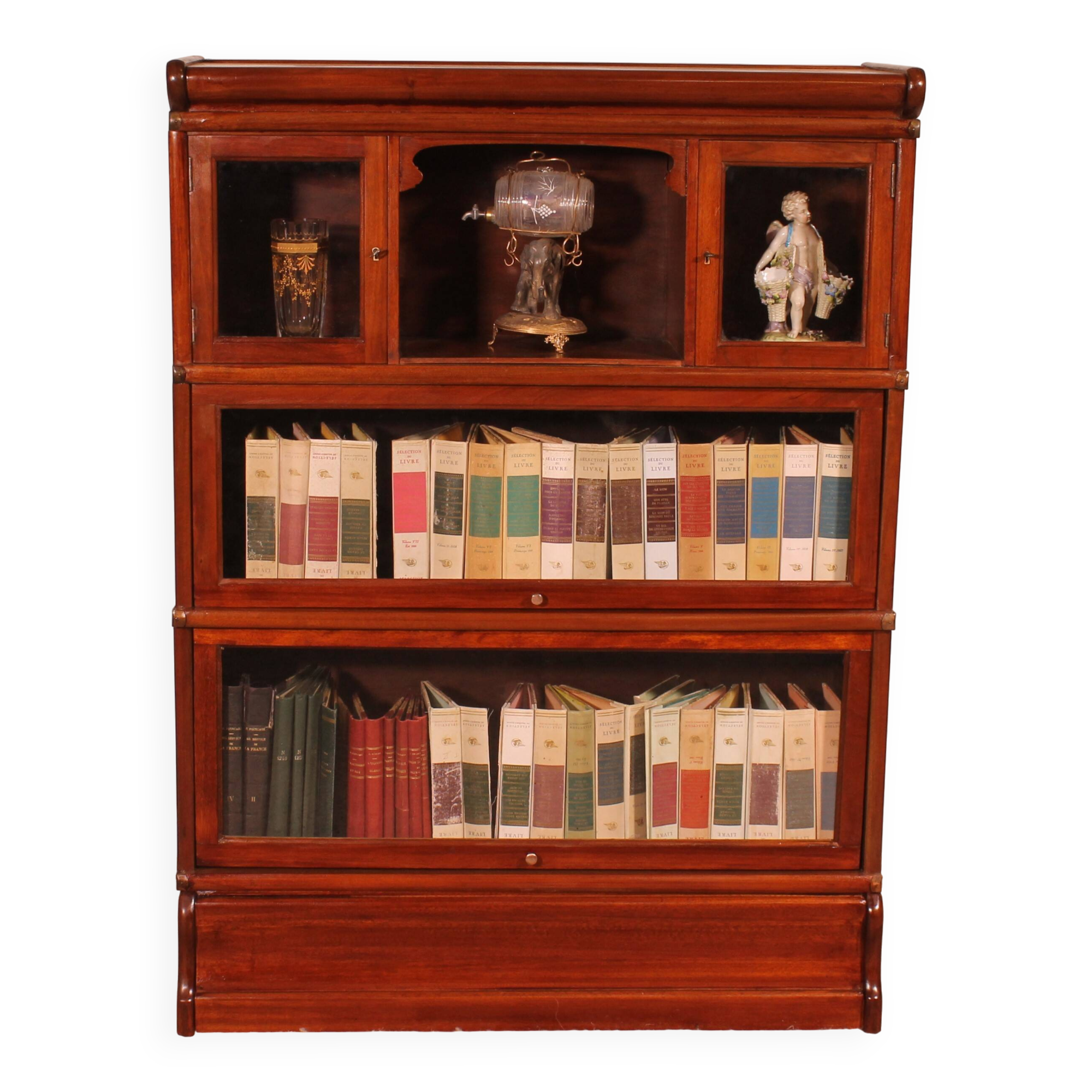 Globe Wernicke Library in Mahogany with 3 pieces and a small cabinet.