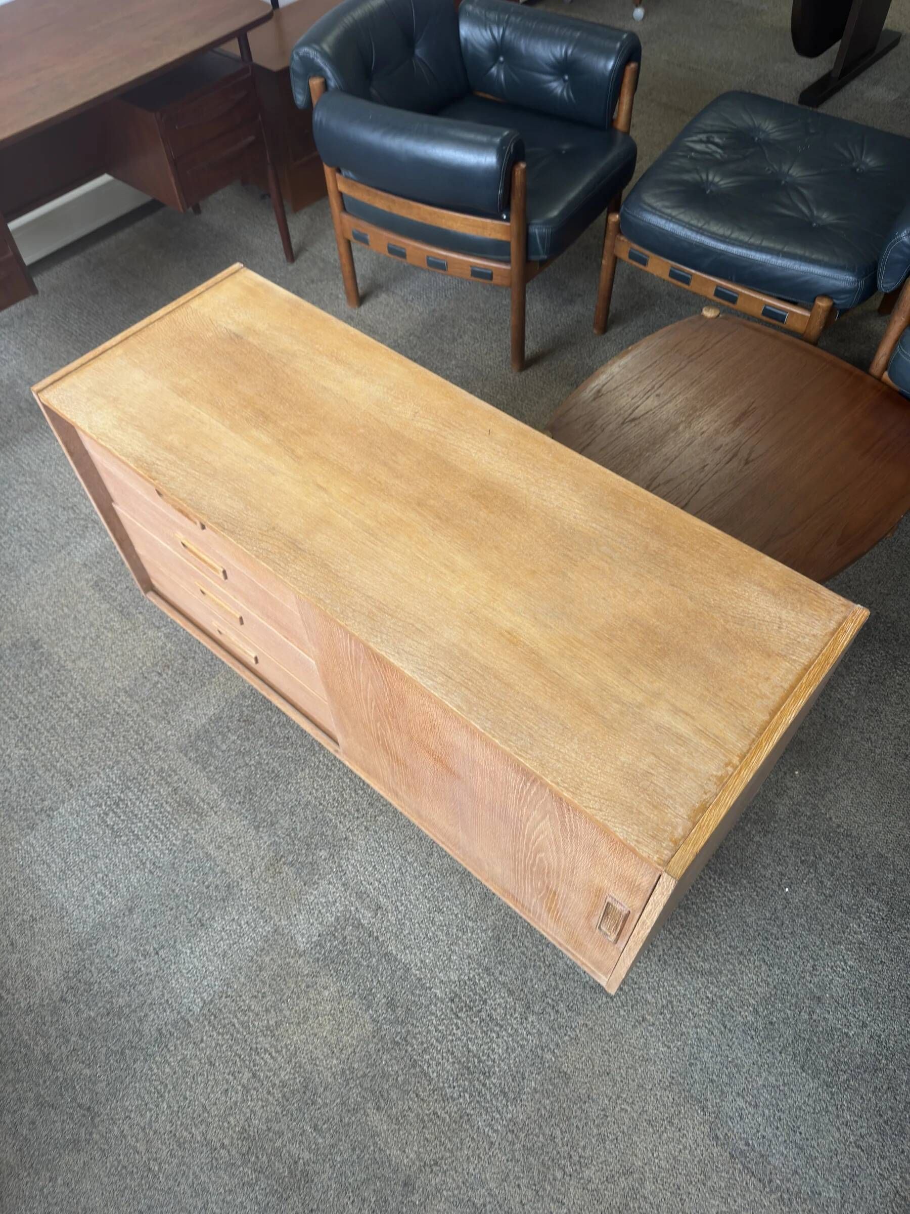 Danish buffet in light oak with sliding door and four drawers.