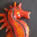 Two vintage ceramic wall pots featuring a seahorse and a starfish.