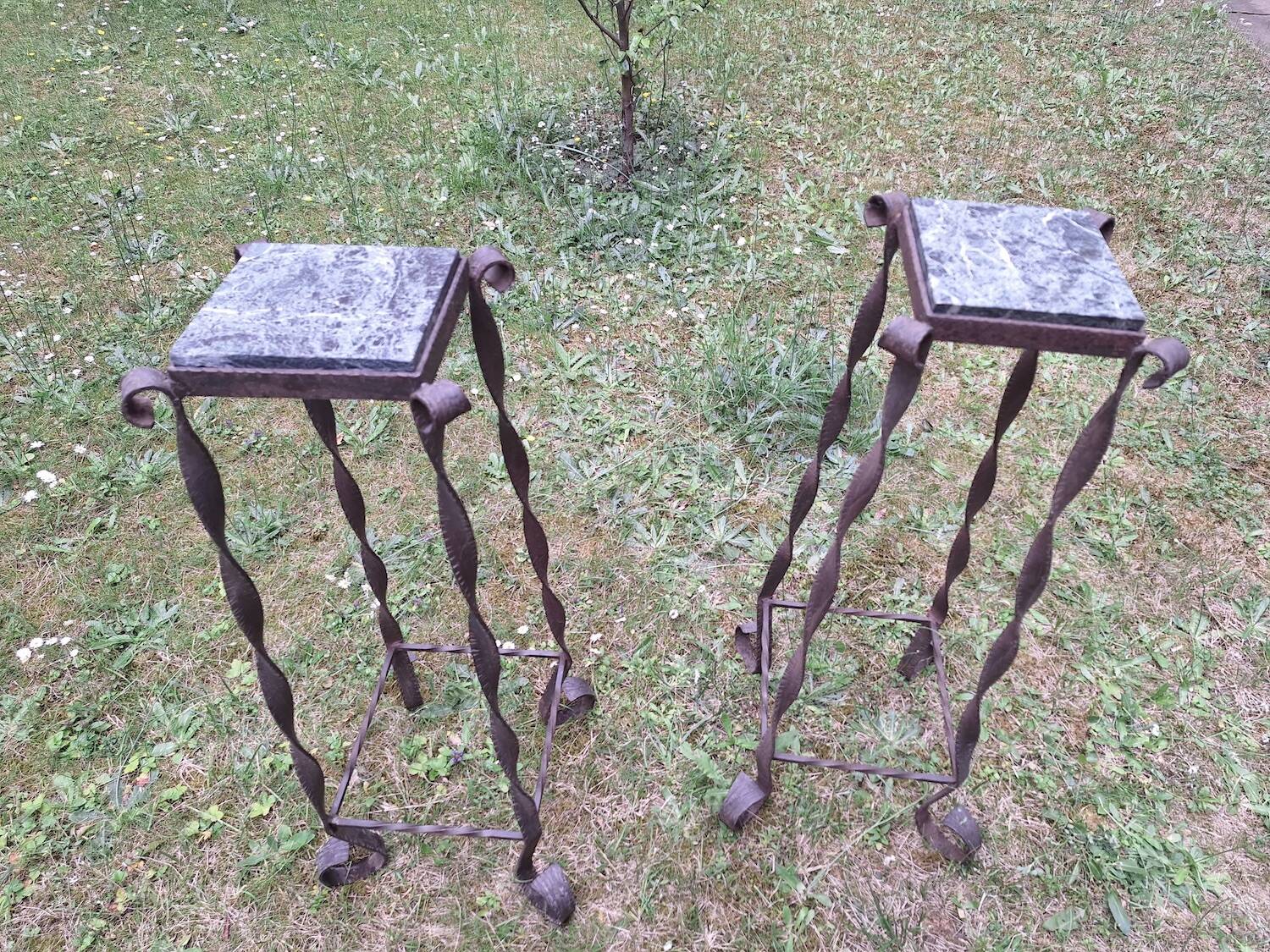 Pair of Brutalist patinated iron and veined marble columns, 1960s
