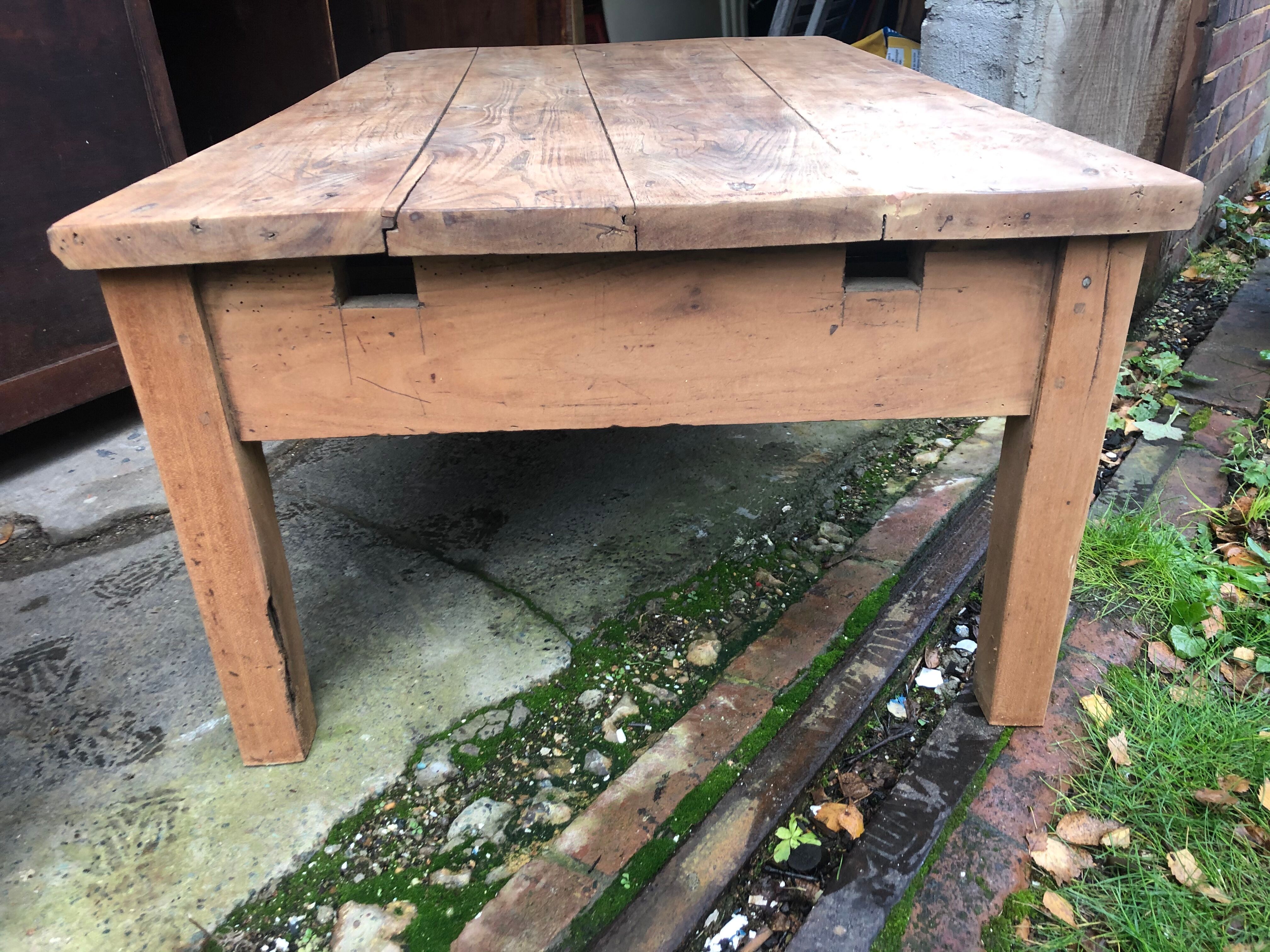 Raw wood farm table coffee table