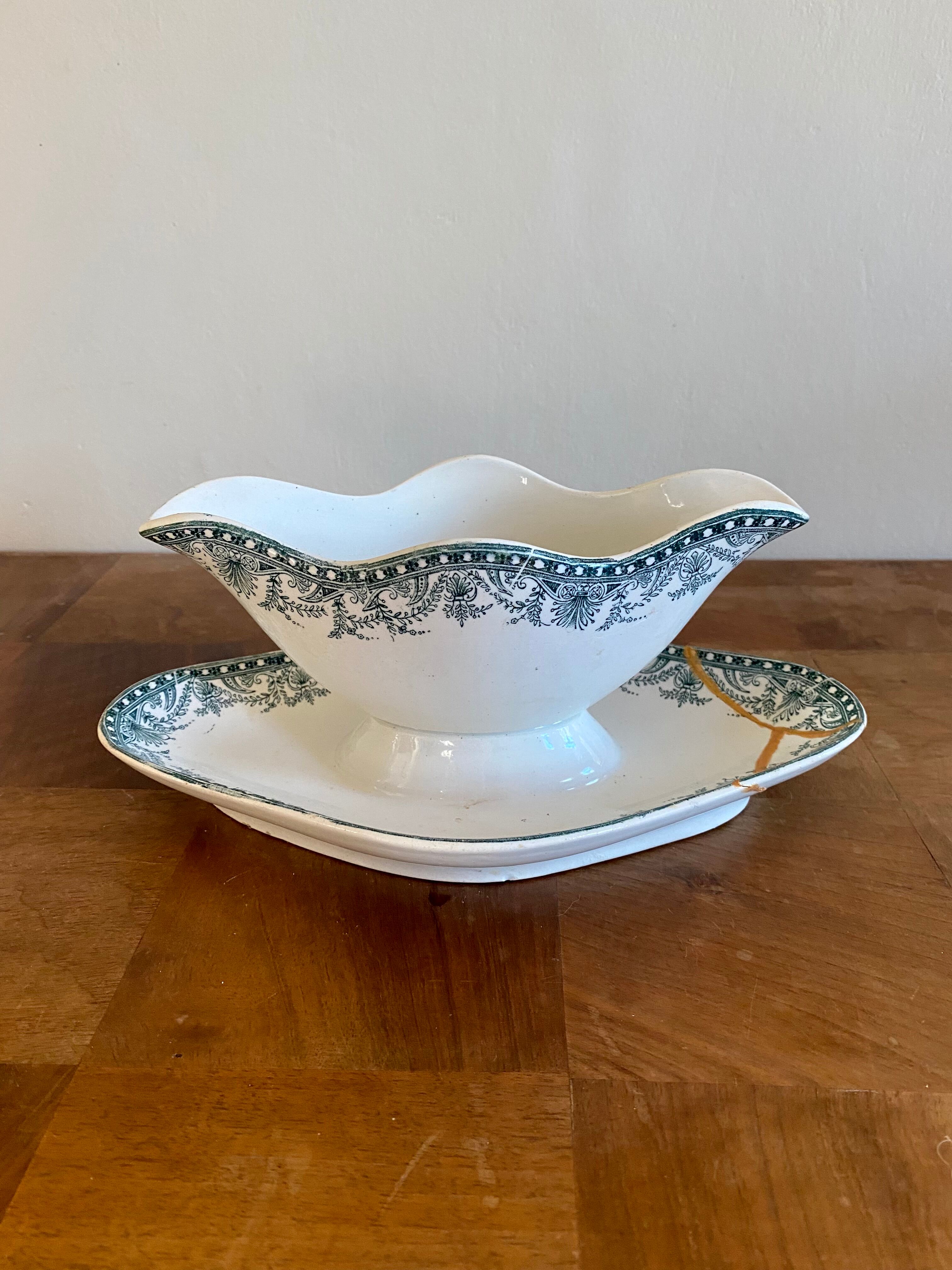 Old gravy boat repaired with the Japanese kintsugi technique