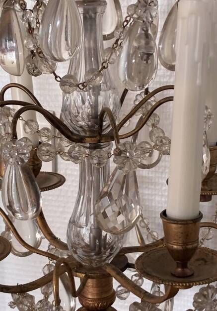 Candle holder or candelabrum with four arms of light.