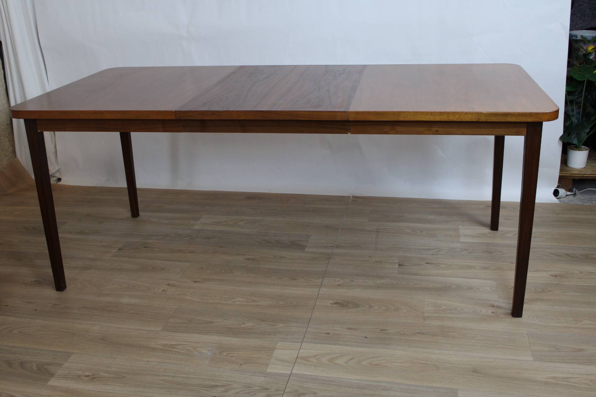 Vintage rectangular teak table with 130 cm dark legs and extension 1960 Sweden