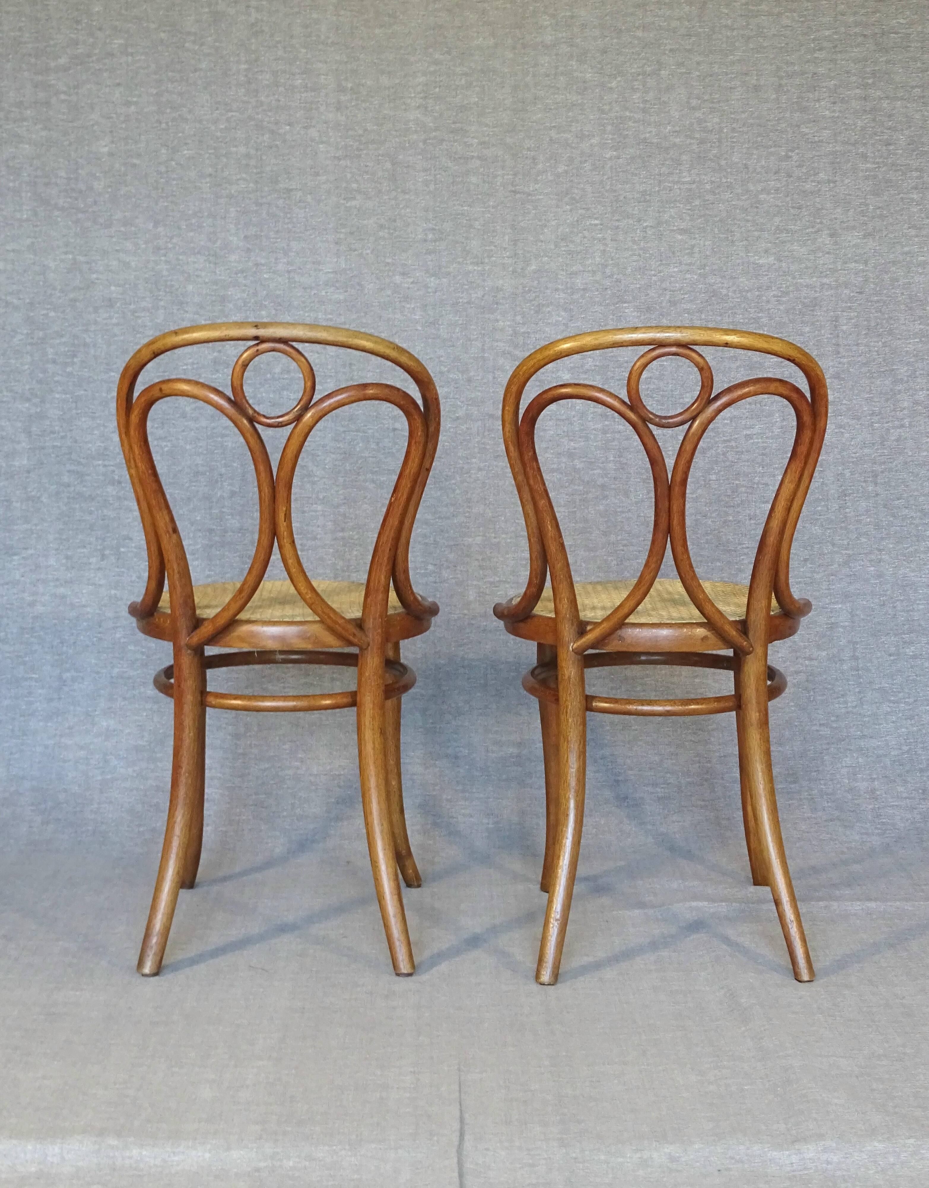2 Thonet No. 19 chairs with new "oak-style" caning.