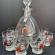 Enamelled glass service signed
