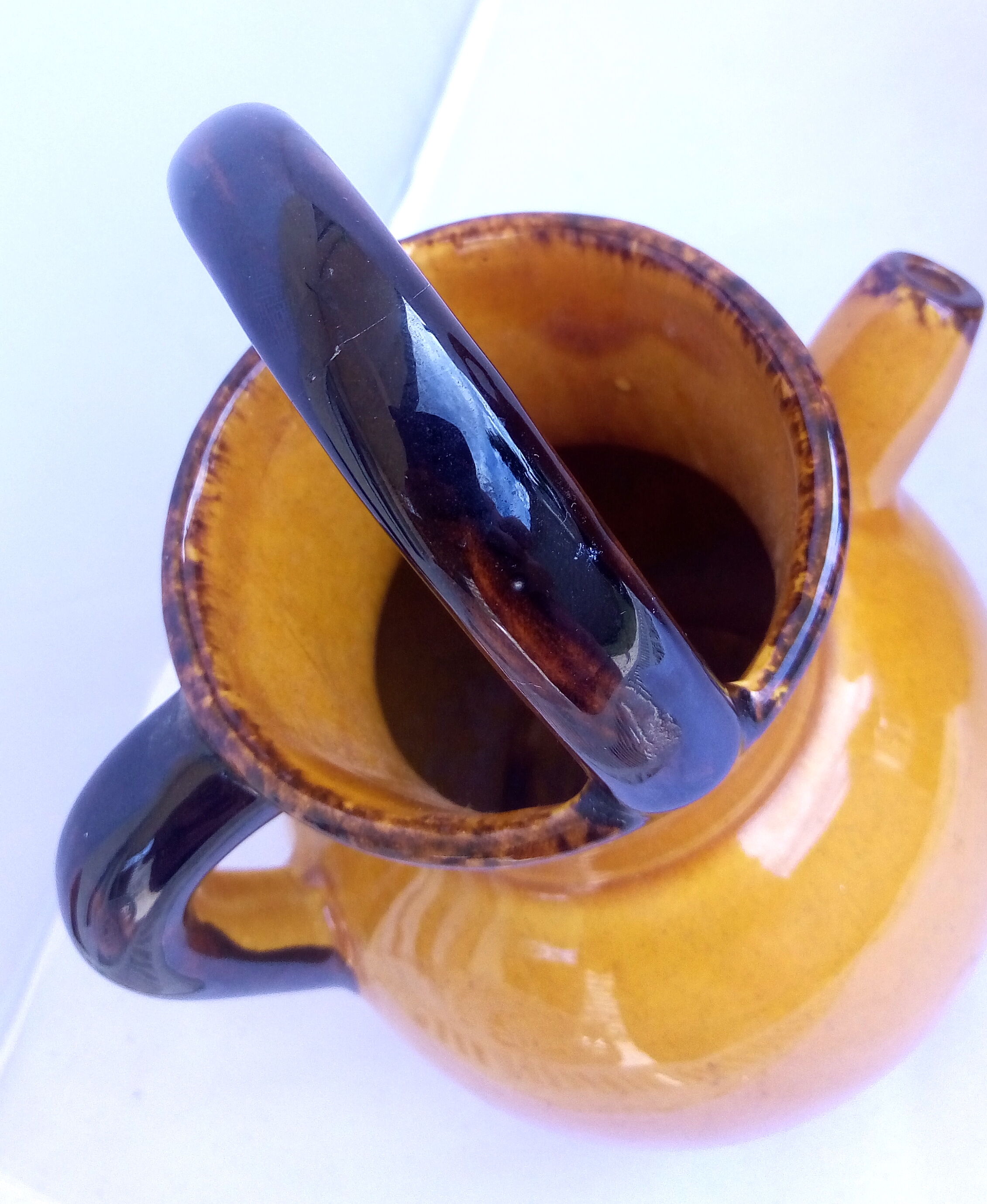 Ochre ceramic jug gargoulette