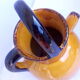 Ochre ceramic jug gargoulette