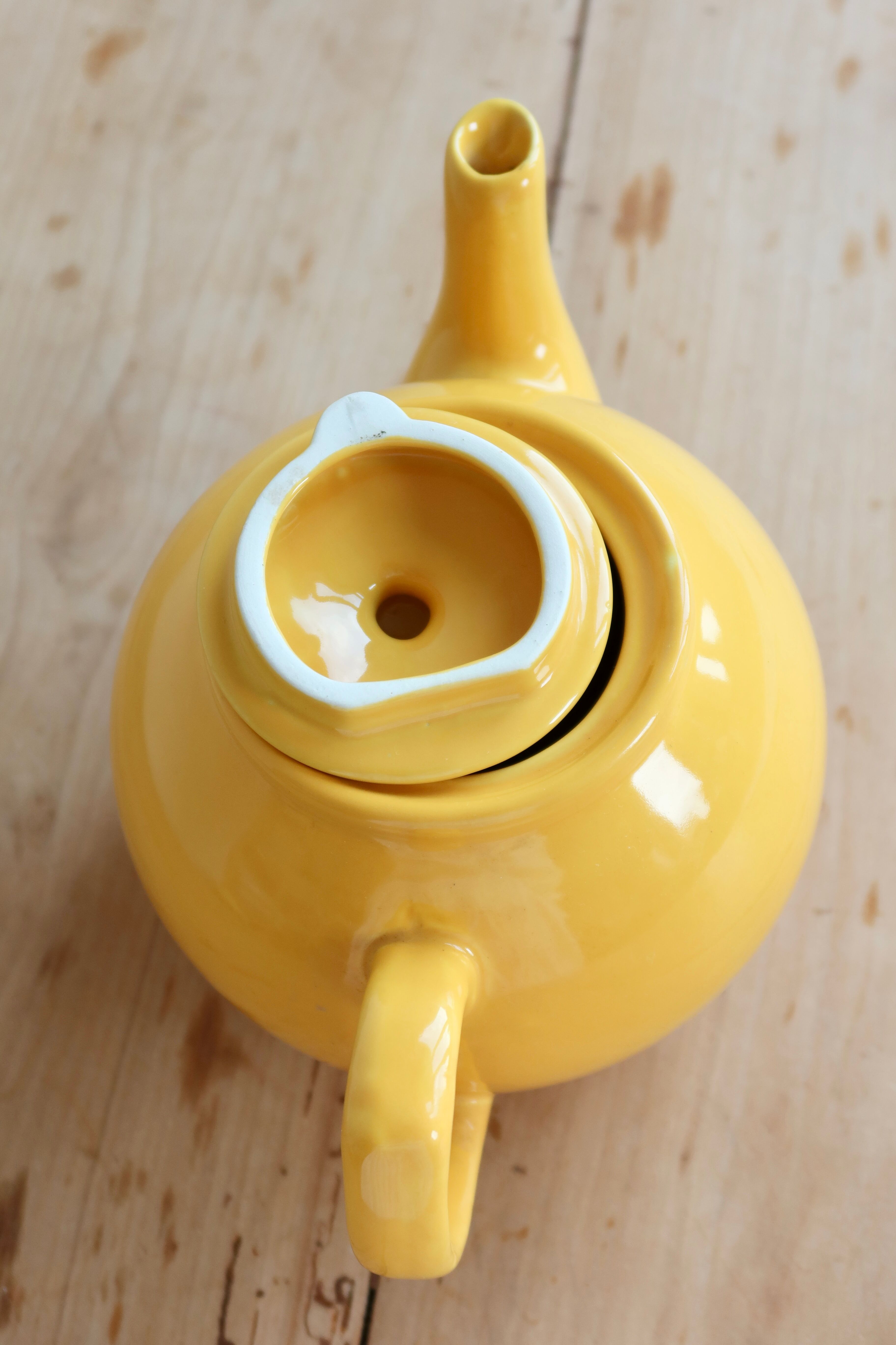 Vintage bright yellow ceramic teapot